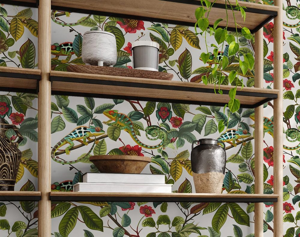 A green, grey, beige and red wallpaper of flowers intertwined with cheeky chameleons. Design available exclusively from Wallpaper Online South Africa.