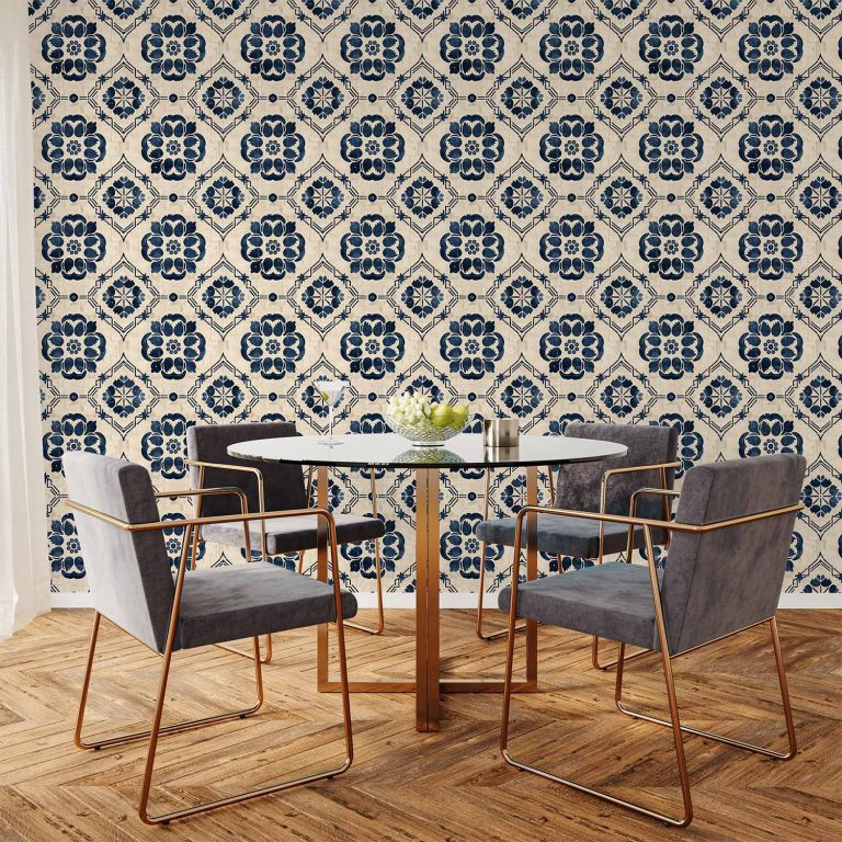 This image shows a wallpaper that features a classic Iberian tile-inspired pattern with navy blue floral and geometric motifs set against a warm beige textured background in a dining room.