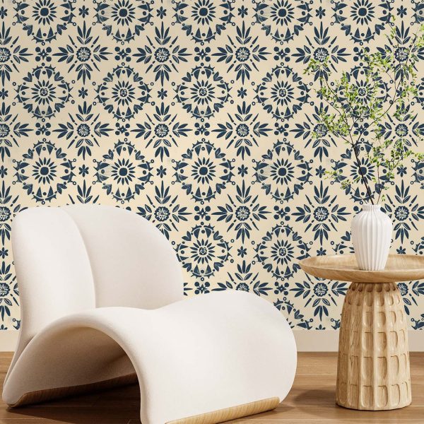 A hand-painted floral wallpaper with deep blue folk-inspired motifs on a warm beige background, blending traditional charm with modern simplicity.