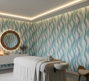 A zoomed in of serene spa interior showcasing teal wave wallpaper with linen texture, massage bed, and soft ambient lighting.