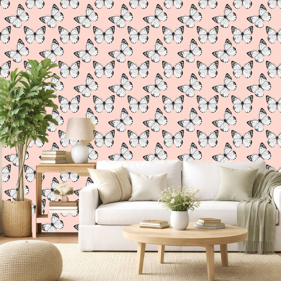 Butterfly Breeze wallpaper zoomed-in with black and white butterflies on a soft blush pink background.
