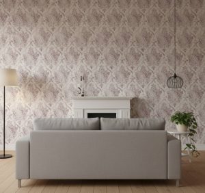 Faded Bramante damask wallpaper in soft mauve, dusty lavender and cream with weathered classical motifs across a heritage bedroom — Wallpaper Online South Africa