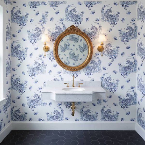 Tiger Winds wallpaper with graceful tigers and ornamental clouds in navy blue and light blue on white across a powder room — Wallpaper Online South Africa