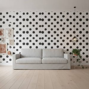 Iota - The Iota Wallpaper features a striking abstract design of organic black circles with textured, hand-drawn edges