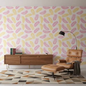 Lightly Blown - This charming wallpaper features hand-painted feathers in soft pink and buttery yellow tones, creating a