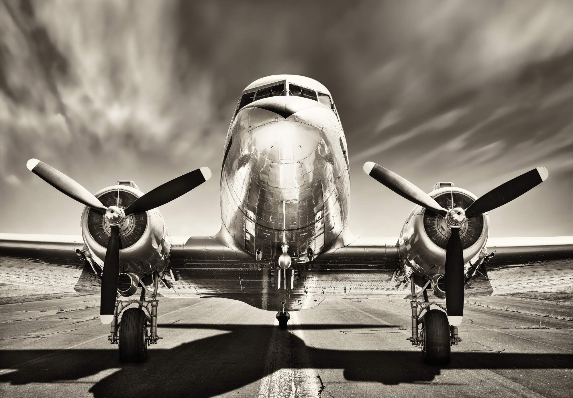 Mural Revolution Heights 2 Wallpaper and Wall Murals South Africa Mural Revolution Heights, vintage propeller aircraft in grey, black and white mural - WallpaperOnline
