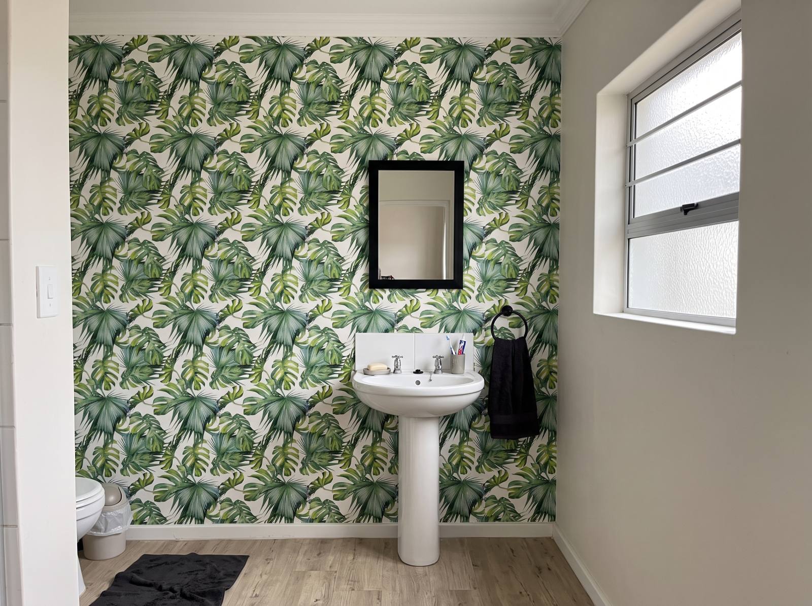 Delicious Palms Wallpaper 3 Wallpaper and Wall Murals South Africa Delicious Palms Wallpaper shown in a bathroom