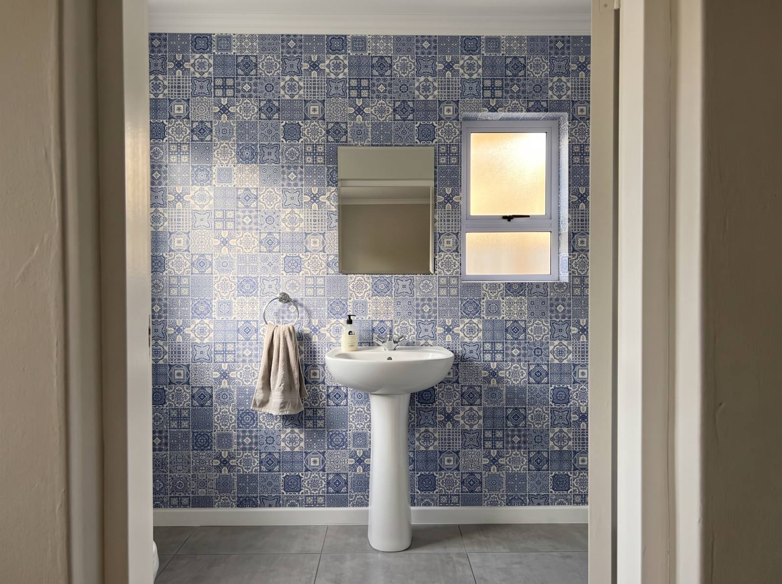 Zurbarán Tile Wallpaper 3 Wallpaper and Wall Murals South Africa Zurbarán Tile Wallpaper shown in a bathroom
