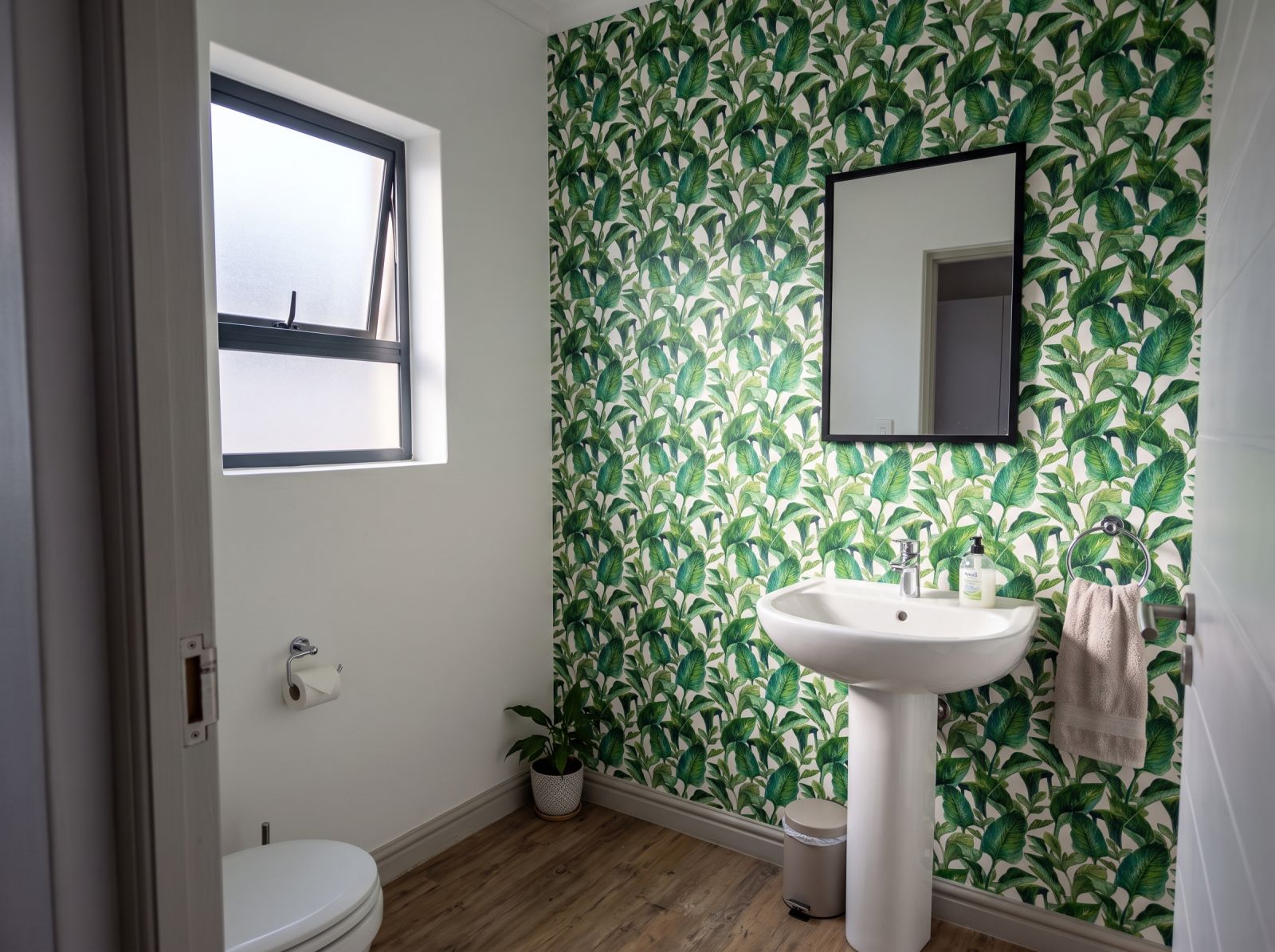 Lush Leaves Wallpaper 3 Wallpaper and Wall Murals South Africa Lush Leaves Wallpaper shown in a bathroom